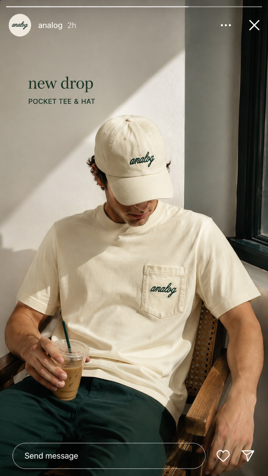 Model wearing the Analog Cafe tee and cap